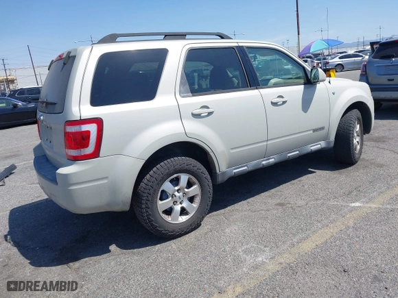 2008 Ford Escape Limited with VIN 1FMCU04188KB76343, listed as a IAAI auction lot 41975218 with 258,847 mi miles. Bid and sale history available at carsss.com. Image 4.