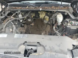 2005 Chevrolet Silverado SS z VIN 2GCEK19N751150820, wystawiony jako Copart lot #77775794 z przebiegiem Nie podano mil oraz Tytuł czysty. Historia ofert i sprzedaży dostępna na DreamBid. Obrazek 11.