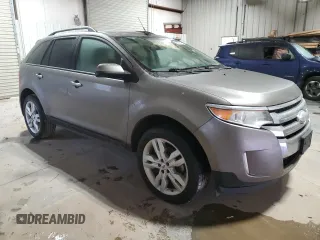 2014 Ford Edge SEL with VIN 2FMDK3JC0EBB38354, listed as a Copart auction lot 43986015 with 104,139 mi miles and Salvage Title. Bid and sale history available at carsss.com. Image 4.