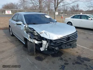 2016 Volkswagen Passat 1.8T SEL with VIN 1VWCT7A3XGC018484, listed as a IAAI auction lot 41763388 with 123,484 mi miles. Bid and sale history available at carsss.com. Image 6.