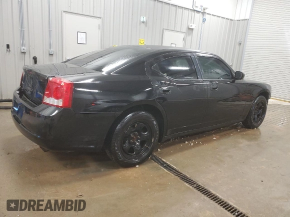 2010 Dodge Charger Police with VIN 2B3AA4CTXAH228620, listed as a Copart auction lot 84744964 with 158,440 mi miles and Clean Title. Bid and sale history available at DreamBid. Image 3.