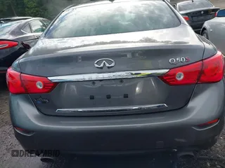 2014 Infiniti Q50 Premium with VIN JN1BV7AP8EM693109, listed as a IAAI auction lot 42183699 with 171,981 mi miles and . Bid and sale history available at DreamBid. Image 17.