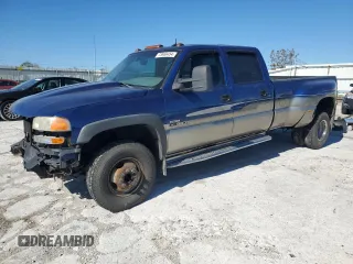 2003 GMC Sierra 3500 SLT z VIN 1GTJC33113F121042, wystawiony jako Copart lot #73668454 z przebiegiem 246 510 mil mil oraz Szkody całkowita. Historia ofert i sprzedaży dostępna na DreamBid. Obrazek 1.