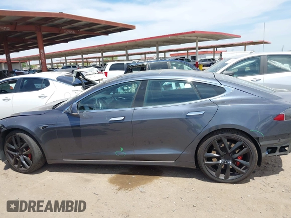 2018 Tesla Model S 75D with VIN 5YJSA1E43JF260547, listed as a IAAI auction lot 42346240 with 89,637 mi miles and . Bid and sale history available at DreamBid. Image 13.