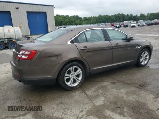 2015 Ford Taurus SEL z VIN 1FAHP2E84FG102075, wystawiony jako Copart lot #59740265 z przebiegiem 90 669 mil mil oraz Szkoda całkowita • Salvage title. Historia ofert i sprzedaży dostępna na DreamBid. Obrazek 3.