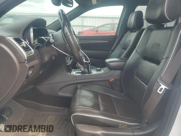 2018 Jeep Grand Cherokee Overland with VIN 1C4RJFCG5JC437508, listed as a Copart auction lot 51814795 with 104,598 mi miles and Salvage title. Bid and sale history available at DreamBid. Image 7.