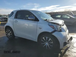 2014 Scion iQ with VIN JTNJJXB01EJ026837, listed as a Copart auction lot 43596385 with 52,826 mi miles and Salvage title. Bid and sale history available at DreamBid. Image 4.