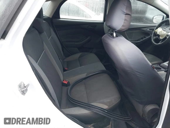 2012 Ford Focus SE z VIN 1FAHP3K20CL197291, wystawiony jako IAAI lot #41643107 z przebiegiem 152 421 mil mil oraz . Historia ofert i sprzedaży dostępna na DreamBid. Obrazek 8.