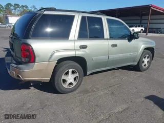 2004 Chevrolet TrailBlazer LS with VIN 1GNDT13S942209802, listed as a IAAI auction lot 41842521 with 197,319 mi miles. Bid and sale history available at carsss.com. Image 4.