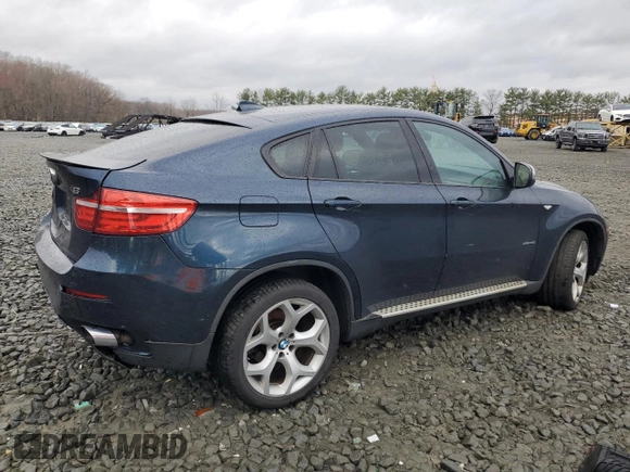 2013 BMW X6 xDrive35i z VIN 5UXFG2C55DL788611, wystawiony jako Copart lot #50972395 z przebiegiem 131 755 mil mil oraz Szkoda całkowita • Salvage title. Historia ofert i sprzedaży dostępna na DreamBid. Obrazek 3.