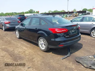 2017 Ford Focus SE with VIN 1FADP3F25HL292056, listed as a IAAI auction lot 42409320 with 102,956 mi miles and . Bid and sale history available at DreamBid. Image 3.