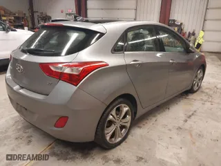 2013 Hyundai Elantra GT with VIN KMHD35LE7DU044309, listed as a IAAI auction lot 41988026 with 128,636 mi miles. Bid and sale history available at carsss.com. Image 4.