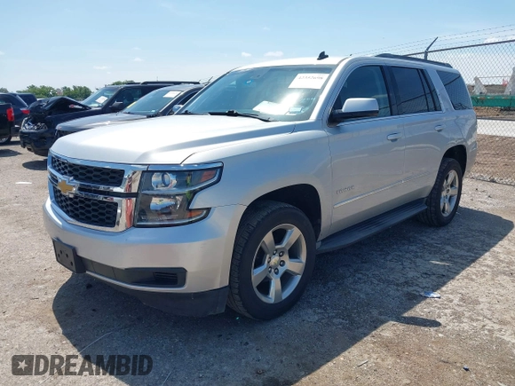 2015 Chevrolet Tahoe LT with VIN 1GNSCBKC9FR223426, listed as a IAAI auction lot 42352698 with 128,339 mi miles and . Bid and sale history available at DreamBid. Image 2.
