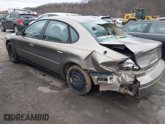 2005 Ford Taurus SE with VIN 1FAFP53215A127489, listed as a IAAI auction lot 40940239 with 127,180 mi miles. Bid and sale history available at carsss.com. Image 3.