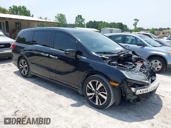 2018 Honda Odyssey Elite z VIN 5FNRL6H91JB109378, wystawiony jako IAAI lot #42270766 z przebiegiem 156 873 mil mil oraz . Historia ofert i sprzedaży dostępna na DreamBid. Obrazek 1.