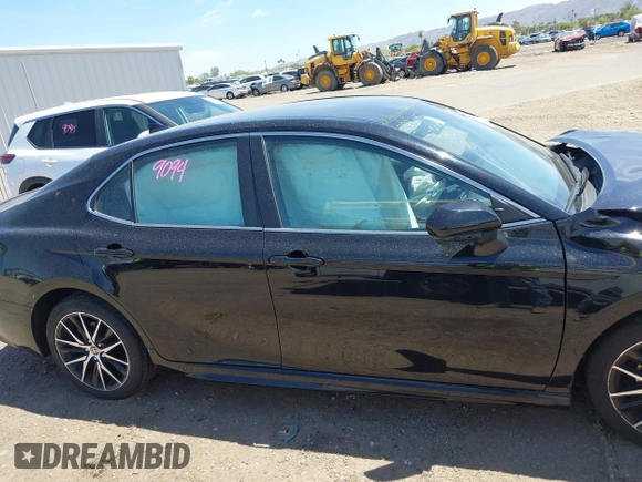 2023 Toyota Camry SE with VIN 4T1G11AK1PU800063, listed as a IAAI auction lot 42121633 with 41,572 mi miles. Bid and sale history available at carsss.com. Image 13.