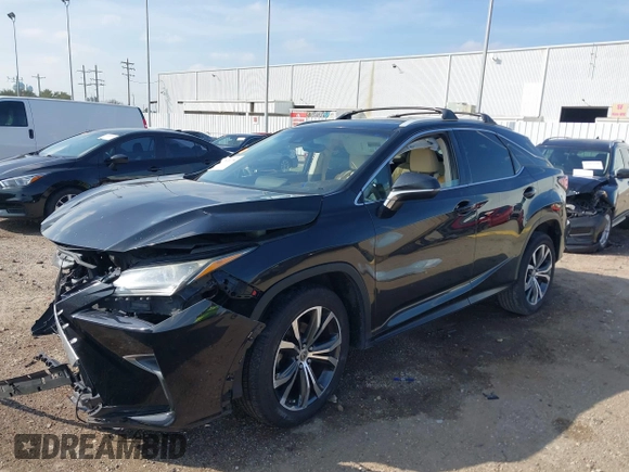 2017 Lexus RX 350 with VIN 2T2ZZMCA5HC042590, listed as a IAAI auction lot 41600994 with 126,660 mi miles and . Bid and sale history available at DreamBid. Image 2.