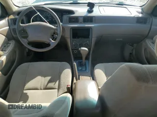 2001 Toyota Camry CE z VIN 4T1BG22KX1U774132, wystawiony jako Copart lot #57632885 z przebiegiem 179 771 mil mil oraz Szkoda całkowita • Salvage title. Historia ofert i sprzedaży dostępna na DreamBid. Obrazek 8.
