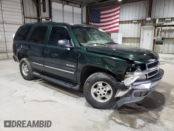 2003 Chevrolet Tahoe LS z VIN 1GNEC13Z23R264941, wystawiony jako Copart lot #56033135 z przebiegiem 195 068 mil mil oraz Szkoda całkowita • Salvage title. Historia ofert i sprzedaży dostępna na DreamBid. Obrazek 4.