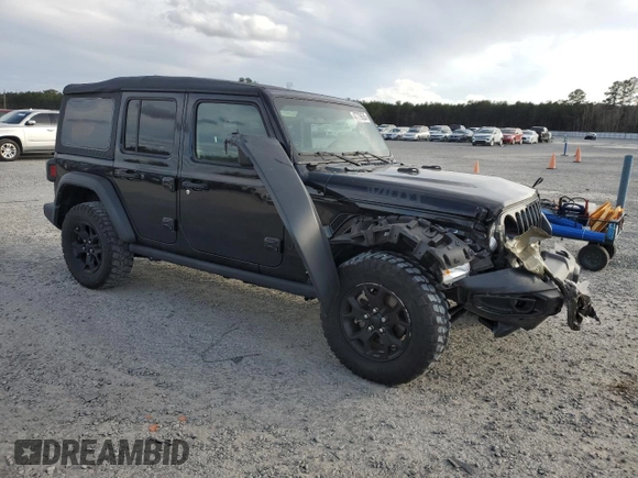 2023 Jeep Wrangler Sport with VIN 1C4HJXDG2PW546208, listed as a Copart auction lot 47779635 with 40,491 mi miles and Salvage Title. Bid and sale history available at DreamBid. Image 4.