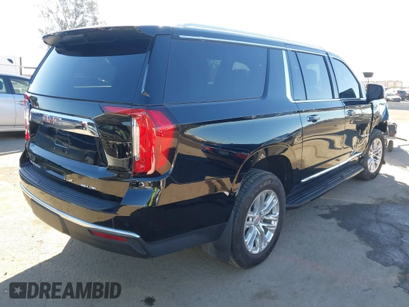2021 GMC Yukon XL SLT with VIN 1GKS2GKD0MR471504, listed as a IAAI auction lot 41668145 with 55,917 mi miles. Bid and sale history available at carsss.com. Image 4.