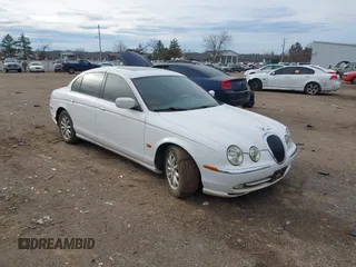 2002 Jaguar S-Type with VIN SAJDA01P12GM35163, listed as a IAAI auction lot 41097415 with 114,017 mi miles and . Bid and sale history available at DreamBid. Image 1.
