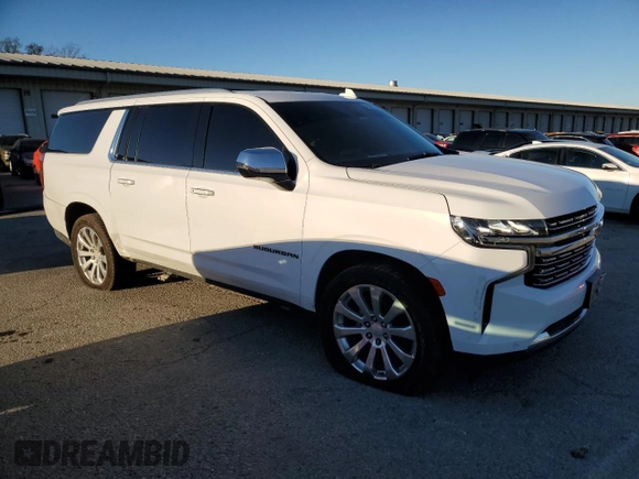 2022 Chevrolet Suburban Premier with VIN 1GNSKFKT7NR242288, listed as a Copart auction lot 79420734 with 77,006 mi miles and Salvage Title. Bid and sale history available at DreamBid. Image 4.