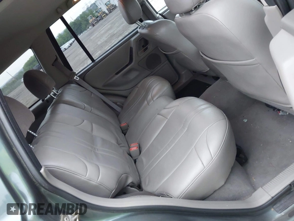 2004 Jeep Grand Cherokee Laredo with VIN 1J4GW48S24C276284, listed as a IAAI auction lot 42596655 with 142,524 mi miles and . Bid and sale history available at DreamBid. Image 8.