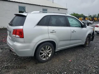 2011 Kia Sorento SX with VIN 5XYKW4A2XBG099857, listed as a Copart auction lot 56946015 with 195,457 mi miles and Salvage title. Bid and sale history available at DreamBid. Image 3.