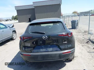 2021 Mazda CX-30 S with VIN 3MVDMBAL6MM302498, listed as a IAAI auction lot 42012356 with 50,477 mi miles and . Bid and sale history available at DreamBid. Image 17.