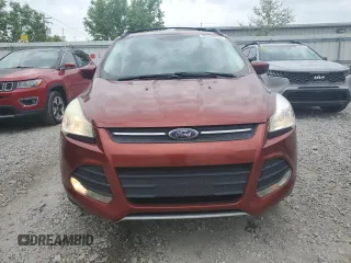 2014 Ford Escape SE with VIN 1FMCU9GXXEUD76953, listed as a Copart auction lot 56340015 with 118,327 mi miles and Salvage title. Bid and sale history available at DreamBid. Image 5.