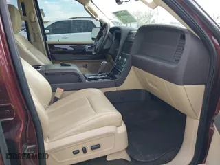 2015 Lincoln Navigator with VIN 5LMJJ2JT4FEJ12021, listed as a IAAI auction lot 41880471 with 104,979 mi miles. Bid and sale history available at carsss.com. Image 5.