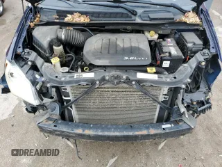2013 Chrysler Town & Country Limited z VIN 2C4RC1GG9DR711585, wystawiony jako Copart lot #52674455 z przebiegiem Nie podano mil oraz Szkoda całkowita • Salvage title. Historia ofert i sprzedaży dostępna na DreamBid. Obrazek 12.