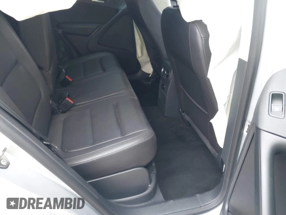 2015 Volkswagen Tiguan SE with VIN WVGAV7AX5FW592216, listed as a IAAI auction lot 41401020 with 110,726 mi miles and . Bid and sale history available at DreamBid. Image 8.