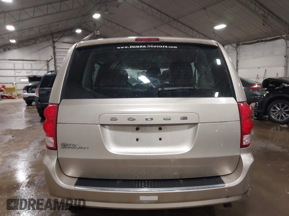 2015 Dodge Grand Caravan SE with VIN 2C4RDGBG2FR592899, listed as a IAAI auction lot 41309499 with 110,428 mi miles and . Bid and sale history available at DreamBid. Image 16.