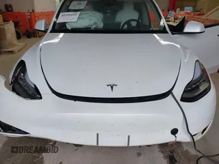 2023 Tesla Model Y Long Range with VIN 7SAYGDEE7PA100523, listed as a IAAI auction lot 40399455 with 18,885 mi miles and . Bid and sale history available at DreamBid. Image 10.