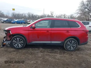 2020 Mitsubishi Outlander ES z VIN JA4AZ3A38LZ020558, wystawiony jako IAAI lot #41694744 z przebiegiem 100 886 mil mil oraz . Historia ofert i sprzedaży dostępna na DreamBid. Obrazek 14.
