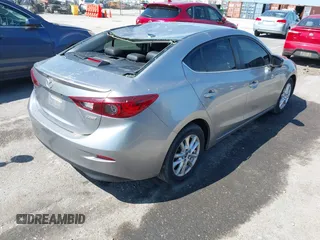 2015 Mazda 3 i Grand Touring with VIN 3MZBM1W71FM182012, listed as a IAAI auction lot 42216129 with 50,804 mi miles and . Bid and sale history available at DreamBid. Image 4.