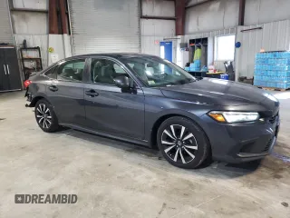 2023 Honda Civic Sedan EX with VIN 2HGFE1F71PH313006, listed as a Copart auction lot 48667815 with 32,942 mi miles and Salvage Title. Bid and sale history available at carsss.com. Image 4.