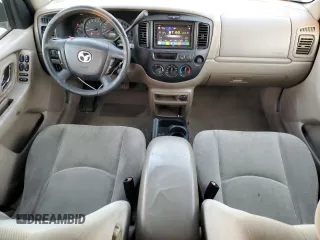 2002 Mazda Tribute LX with VIN 4F2YU09142KM22895, listed as a Copart auction lot 73797364 with 176,514 mi miles and Salvage Title. Bid and sale history available at carsss.com. Image 8.