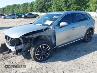 2016 Mazda CX-9 Signature with VIN JM3TCBEY7G0120023, listed as a IAAI auction lot 42431039 with 160,276 mi miles and . Bid and sale history available at DreamBid. Image 17.