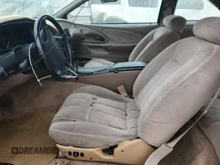 1994 Ford Thunderbird LX with VIN 1FALP6243RH223519, listed as a Copart auction lot 80962814 with 125,016 mi miles and Salvage Title. Bid and sale history available at DreamBid. Image 7.