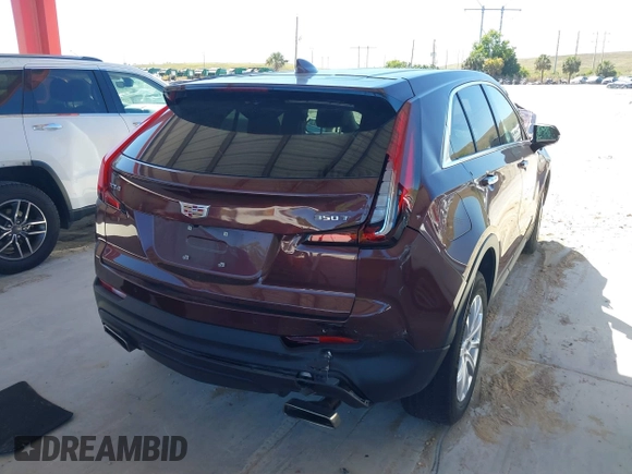 2022 Cadillac XT4 FWD Luxury with VIN 1GYAZAR42NF162880, listed as a IAAI auction lot 41850951 with 47,344 mi miles and . Bid and sale history available at carsss.com. Image 4.