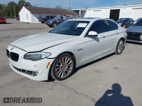 2013 BMW 5 Series 535i with VIN WBAFR7C59DC827660, listed as a IAAI auction lot 41047642 with 131,917 mi miles and . Bid and sale history available at DreamBid. Image 2.