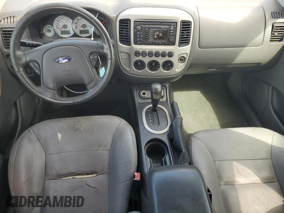 2006 Ford Escape Hybrid z VIN 1FMCU96H36KA35403, wystawiony jako Copart lot #65374705 z przebiegiem 127 689 mil mil oraz Czysty tytuł • Clean title. Historia ofert i sprzedaży dostępna na DreamBid. Obrazek 8.