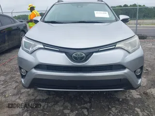 2018 Toyota RAV4 XLE with VIN 2T3WFREV4JW486939, listed as a IAAI auction lot 42355448 with 133,655 mi miles and . Bid and sale history available at DreamBid. Image 12.