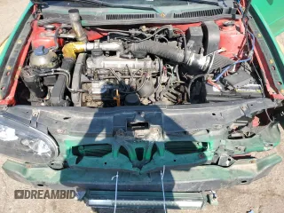 1999 Volkswagen Golf z VIN WVWBF31J6XW245599, wystawiony jako Copart lot #71473934 z przebiegiem 223 072 mil mil oraz Szkoda całkowita • Salvage title. Historia ofert i sprzedaży dostępna na DreamBid. Obrazek 11.