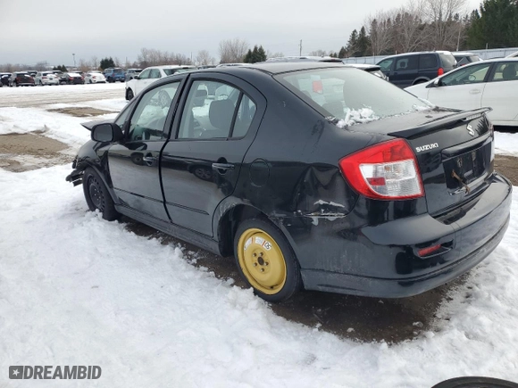2011 Suzuki SX4 Sedan Sport with VIN JS2YC5A80B6300378, listed as a Copart auction lot 86095334 with 113,238 mi miles and Salvage Title. Bid and sale history available at carsss.com. Image 2.