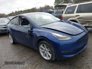 2023 Tesla Model Y Long Range z VIN 7SAYGDEE7PF673988, wystawiony jako IAAI lot #41057651 z przebiegiem 29 683 mil mil oraz . Historia ofert i sprzedaży dostępna na DreamBid. Obrazek 1.