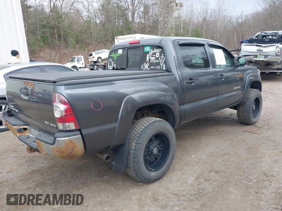 2009 Toyota Tacoma with VIN 3TMLU42N99M036667, listed as a IAAI auction lot 41856732 with 168,748 mi miles and . Bid and sale history available at DreamBid. Image 4.